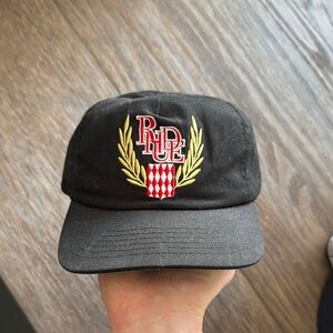 Rhude Black Cap with Red and Gold Embroidery